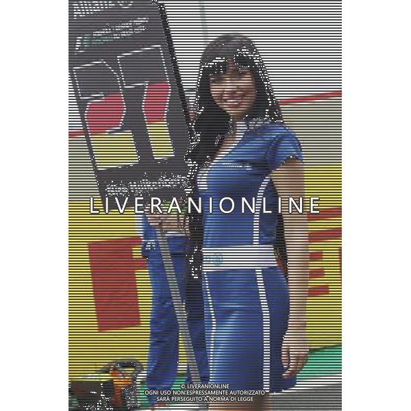 Grid girl. 09.11.2014. Formula 1 World Championship, Rd 18, Brazilian Grand Prix, Sao Paulo, Brazil, Race Day. - www.xpbimages.com, EMail: requests@xpbimages.com - copy of publication required for printed pictures. Every used picture is fee-liable. © Copyright: Photo4 / XPB Images /AGENZIA ALDO LIVERANI SAS - ITALY ONLY - EDITORIAL USE ONLY - Grand Prix Gp F1 Brasile gara