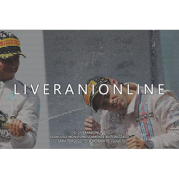 Felipe Massa (BRA) Williams celebrates his third position on the podium with Lewis Hamilton (GBR) Mercedes AMG F1. 09.11.2014. Formula 1 World Championship, Rd 18, Brazilian Grand Prix, Sao Paulo, Brazil, Race Day. AG ALDO LIVERANI SAS ONLY ITALY