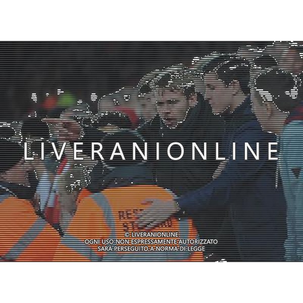 An Arsenal fan is told to calm down by the stewards Photographer Ian Cook/CameraSport Football - Barclays Premiership - Swansea City v Arsenal - Sunday 9th November 2014 - Liberty Stadium - Swansea © CameraSport - 43 Linden Ave. Countesthorpe. Leicester. England. LE8 5PG - Tel: +44 (0) 116 277 4147 - admin@camerasport.com - www.camerasport.com AG ALDO LIVERANI SAS ONLY ITALY