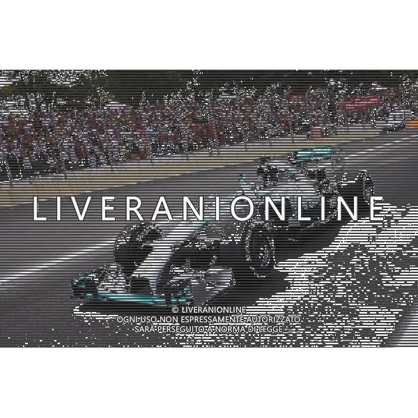 Race winner Nico Rosberg (GER) Mercedes AMG F1 W05 celebrates at the end of the race. 09.11.2014. Formula 1 World Championship, Rd 18, Brazilian Grand Prix, Sao Paulo, Brazil, Race Day. AG ALDO LIVERANI SAS ONLY ITALY