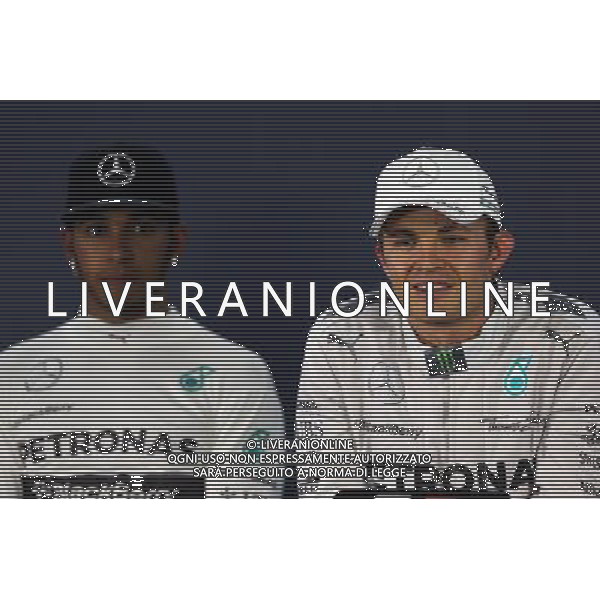 Race winner Nico Rosberg (GER) Mercedes AMG F1 (Right) in the FIA Press Conference with team mate Lewis Hamilton (GBR) Mercedes AMG F1. 09.11.2014. Formula 1 World Championship, Rd 18, Brazilian Grand Prix, Sao Paulo, Brazil, Race Day. AG ALDO LIVERANI SAS ONLY ITALY