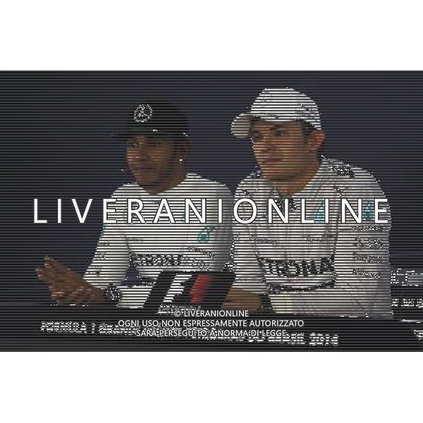 (L to R): Lewis Hamilton (GBR) Mercedes AMG F1 and team mate Nico Rosberg (GER) Mercedes AMG F1 in the FIA Press Conference. 09.11.2014. Formula 1 World Championship, Rd 18, Brazilian Grand Prix, Sao Paulo, Brazil, Race Day. AG ALDO LIVERANI SAS ONLY ITALY