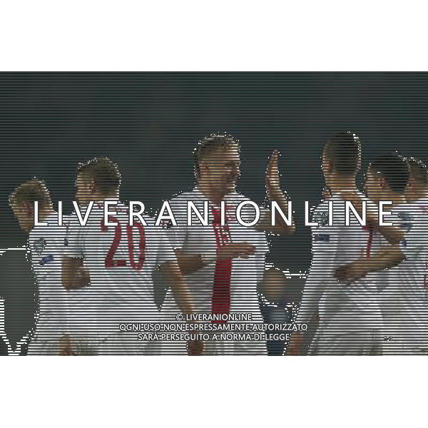 14.11.2014 TIBILISI, GRUZJA (TIBILISI, GEORGIA) - STADION BORISA PAICZADZE (BORIS PAICHADZE STADIUM) PILKA NOZNA ( FOOTBALL ) ELIMINACJE EURO 2016 ( UEFA EURO 2016 QUALIFICATION ) MECZ GRUZJA - POLSKA ( GAME GEORGIA - POLAND ) NZ LUKASZ PISZCZEK, KAMIL GLIK - RADOSC, BRAMKA, GOL FOTO LUKASZ GROCHALA/CYFRASPORT/NEWSPIX.PL --- Newspix.pl /Agenzia Aldo Liverani sas - ITALY ONLY - EDITORIAL USE ONLY - Georgia - Polonia qualificazioni Europei UEFA del 2016 *** Local Caption *** www.newspix.pl mail us: info@newspix.pl call us: 0048 022 23 22 222 --- Polish Picture Agency by Ringier Axel Springer Poland