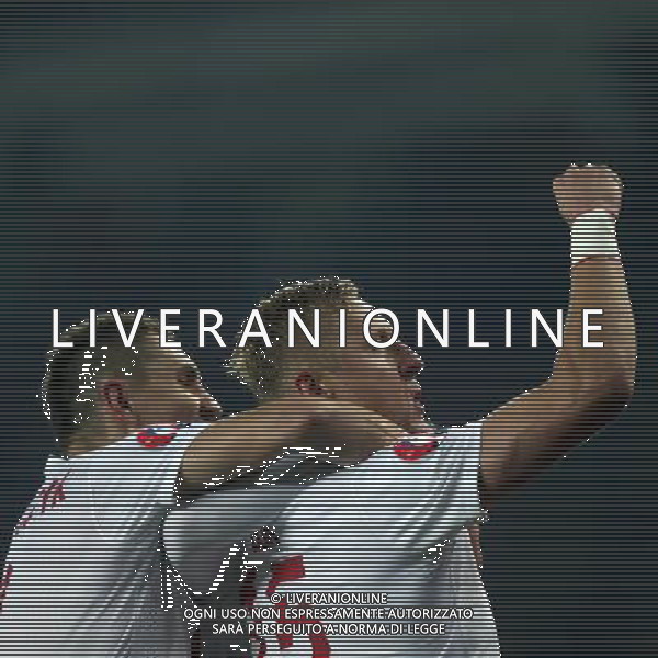 14.11.2014 TIBILISI, GRUZJA (TIBILISI, GEORGIA) - STADION BORISA PAICZADZE (BORIS PAICHADZE STADIUM) PILKA NOZNA ( FOOTBALL ) ELIMINACJE EURO 2016 ( UEFA EURO 2016 QUALIFICATION ) MECZ GRUZJA - POLSKA ( GAME GEORGIA - POLAND ) NZ ARTUR JEDRZEJCZYK, KAMIL GLIK - RADOSC, BRAMKA, GOL FOTO LUKASZ GROCHALA/CYFRASPORT/NEWSPIX.PL --- Newspix.pl /Agenzia Aldo Liverani sas - ITALY ONLY - EDITORIAL USE ONLY - Georgia - Polonia qualificazioni Europei UEFA del 2016 *** Local Caption *** www.newspix.pl mail us: info@newspix.pl call us: 0048 022 23 22 222 --- Polish Picture Agency by Ringier Axel Springer Poland