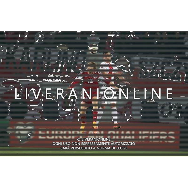TBILISI 14.11.2014 MECZ ELIMINACJE DO MISTRZOSTW EUROPY FRANCJA 2016 GRUPA D: GRUZJA - POLSKA --- QUALIFICATION FOR UEFA EURO 2016 MATCH GROUP D: GEORGIA - POLAND ALEXANDER KOBAKHIDZE ARKADIUSZ MILIK FOT. PIOTR KUCZA/NEWSPIX.PL --- Newspix.pl /Agenzia Aldo Liverani sas - ITALY ONLY - EDITORIAL USE ONLY - Georgia - Polonia qualificazioni Europei UEFA del 2016 *** Local Caption *** www.newspix.pl mail us: info@newspix.pl call us: 0048 022 23 22 222 --- Polish Picture Agency by Ringier Axel Springer Poland