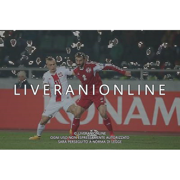 TBILISI 14.11.2014 MECZ ELIMINACJE DO MISTRZOSTW EUROPY FRANCJA 2016 GRUPA D: GRUZJA - POLSKA --- QUALIFICATION FOR UEFA EURO 2016 MATCH GROUP D: GEORGIA - POLAND KAMIL GROSICKI UCHA LOBZHANIDZE FOT. PIOTR KUCZA/NEWSPIX.PL --- Newspix.pl /Agenzia Aldo Liverani sas - ITALY ONLY - EDITORIAL USE ONLY - Georgia - Polonia qualificazioni Europei UEFA del 2016 *** Local Caption *** www.newspix.pl mail us: info@newspix.pl call us: 0048 022 23 22 222 --- Polish Picture Agency by Ringier Axel Springer Poland