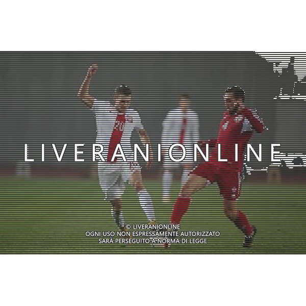 TBILISI 14.11.2014 MECZ ELIMINACJE DO MISTRZOSTW EUROPY FRANCJA 2016 GRUPA D: GRUZJA - POLSKA --- QUALIFICATION FOR UEFA EURO 2016 MATCH GROUP D: GEORGIA - POLAND LUKASZ PISZCZEK GURAM KASHIA FOT. PIOTR KUCZA/NEWSPIX.PL --- Newspix.pl /Agenzia Aldo Liverani sas - ITALY ONLY - EDITORIAL USE ONLY - Georgia - Polonia qualificazioni Europei UEFA del 2016 *** Local Caption *** www.newspix.pl mail us: info@newspix.pl call us: 0048 022 23 22 222 --- Polish Picture Agency by Ringier Axel Springer Poland