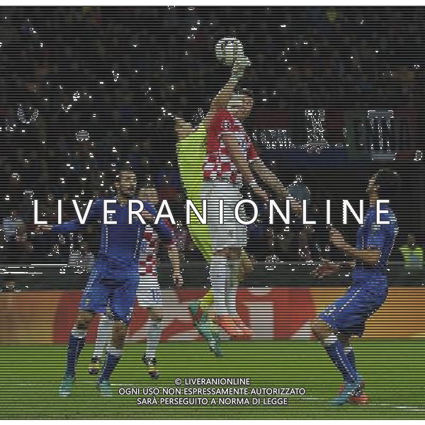 Qualificazioni ai Campionati Europei di Calcio UEFA Francia 2016 Gruppo H Milano - 16.11.2014 Italia-Croazia Nella Foto:buffon perde il pallone sul contrasto di mandzukic poi il colpo di testa di olic salvato da ranocchia /Ph.Vitez-Ag. Aldo Liverani