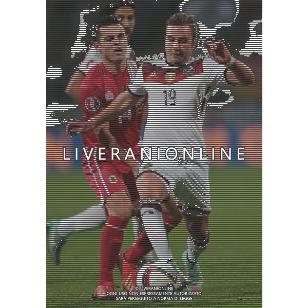 firo : Fu§ball,Fussball : 14.11.2014 EM, Euro, Euro 2016, Qualifikation, Nationalmannschaft, GER - GIB, Deutschland - Gibraltar, Mario Gštze, Goetze ( Deutschland ) im Zweikampf mit Jack Sergeant ( Gibraltar ) $worldrightsEs gelten unsere AGB, einsehbar auf www.firosportphoto.de copyright by firo sportphoto: Coesfelder Str. 207 D- 48249 DŸlmen www.firosportphoto.de mail@firosportphoto.de (V o l k s b a n k B o c h u m - W i t t e n ) BLZ.: 430 601 29 Kt. Nr.: 341 117 100 Tel: +49-2594 - 9916004 Fax: +49-2594 - 9916005 AG ALDO LIVERANI SAS ONLY ITALY