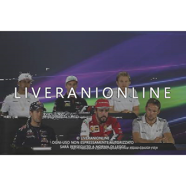 Sebastian Vettel (GER), Red Bull Racing, Fernando Alonso (ESP), Scuderia Ferrari and Jenson Button (GBR), McLaren F1 Team 20.11.2014. Formula 1 World Championship, Rd 19, Abu Dhabi Grand Prix, Yas Marina Circuit, Abu Dhabi, Preparation Day. AG ALDO LIVERANI SAS ONLY ITALY