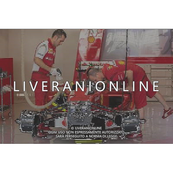 A Ferrari F14-T is prepared in the pits. 20.11.2014. Formula 1 World Championship, Rd 19, Abu Dhabi Grand Prix, Yas Marina Circuit, Abu Dhabi, Preparation Day. AG ALDO LIVERANI SAS ONLY ITALY