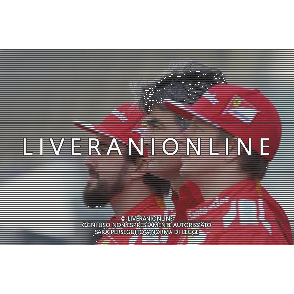 Marco Mattiacci (ITA) Ferrari Team Principal, Kimi Raikkonen (FIN), Scuderia Ferrari and Fernando Alonso (ESP), Scuderia Ferrari 21.11.2014. Formula 1 World Championship, Rd 19, Abu Dhabi Grand Prix, Yas Marina Circuit, Abu Dhabi, Practice Day. AG ALDO LIVERANI SAS ONLY ITALY