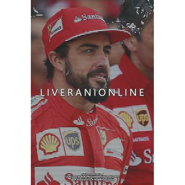 Fernando Alonso (ESP) Ferrari at a team photograph. 21.11.2014. Formula 1 World Championship, Rd 19, Abu Dhabi Grand Prix, Yas Marina Circuit, Abu Dhabi, Practice Day. AG ALDO LIVERANI SAS ONLY ITALY