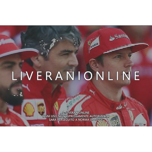 (L to R): Fernando Alonso (ESP) Ferrari with Marco Mattiacci (ITA) Ferrari Team Principal and Kimi Raikkonen (FIN) Ferrari at a team photograph. 21.11.2014. Formula 1 World Championship, Rd 19, Abu Dhabi Grand Prix, Yas Marina Circuit, Abu Dhabi, Practice Day. AG ALDO LIVERANI SAS ONLY ITALY