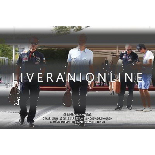 (L to R): Christian Horner (GBR) Red Bull Racing Team Principal with Mario Illien (SUI) Ilmor Engineering Co-Founder. 21.11.2014. Formula 1 World Championship, Rd 19, Abu Dhabi Grand Prix, Yas Marina Circuit, Abu Dhabi, Practice Day. AG ALDO LIVERANI SAS ONLY ITALY