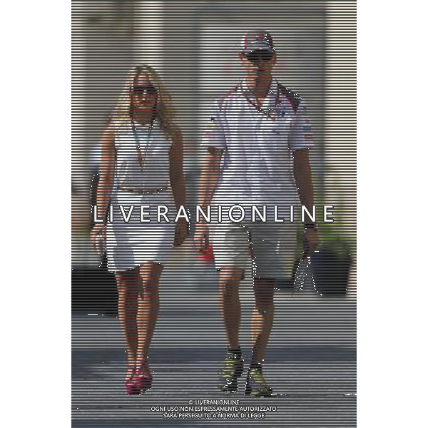 Adrian Sutil (GER), Sauber F1 Team and his girlfriend 21.11.2014. Formula 1 World Championship, Rd 19, Abu Dhabi Grand Prix, Yas Marina Circuit, Abu Dhabi, Pr AG ALDO LIVERANI SAS ONLY ITALY