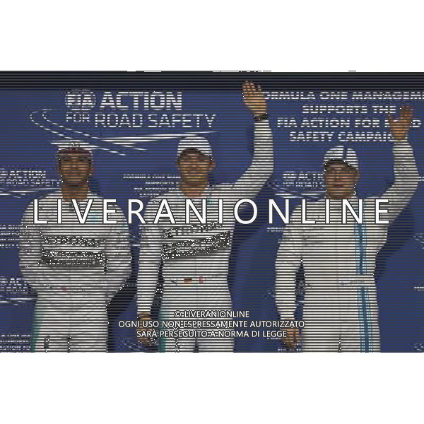 Pole for Nico Rosberg (GER) Mercedes AMG F1 W05, 2nd for Lewis Hamilton (GBR) Mercedes AMG F1 and 3rd for Valtteri Bottas (FIN) Williams FW36. 22.11.2014. Formula 1 World Championship, Rd 19, Abu Dhabi Grand Prix, Yas Marina Circuit, Abu Dhabi, Qualifying Day. AG ALDO LIVERANI SAS ONLY ITALY