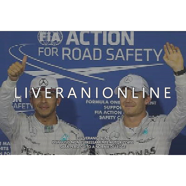 Lewis Hamilton (GBR), Mercedes AMG F1 Team and Nico Rosberg (GER), Mercedes AMG F1 Team 22.11.2014. Formula 1 World Championship, Rd 19, Abu Dhabi Grand Prix, Yas Marina Circuit, Abu Dhabi, Qualifying Day. AG ALDO LIVERANI SAS ONLY ITALY