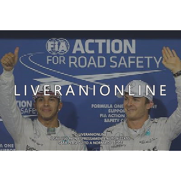 Lewis Hamilton (GBR), Mercedes AMG F1 Team and Nico Rosberg (GER), Mercedes AMG F1 Team 22.11.2014. Formula 1 World Championship, Rd 19, Abu Dhabi Grand Prix, Yas Marina Circuit, Abu Dhabi, Qualifying Day. AG ALDO LIVERANI SAS ONLY ITALY