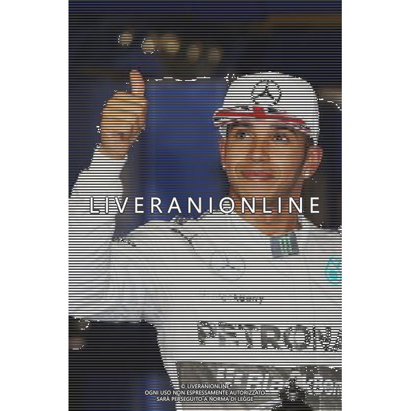 Second placed Lewis Hamilton (GBR) Mercedes AMG F1 in qualifying parc ferme. 22.11.2014. Formula 1 World Championship, Rd 19, Abu Dhabi Grand Prix, Yas Marina Circuit, Abu Dhabi, Qualifying Day. AG ALDO LIVERANI SAS ONLY ITALY