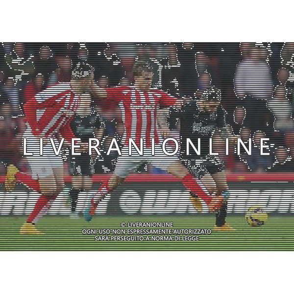 Burnley\'s Danny Ings (R) and Stoke City\'s Marc Muniesa (C) in action during todays match Photographer Jack Phillips/CameraSport Football - Barclays Premiership - Stoke City v Burnley - Saturday 22nd November 2014 - Britannia Stadium - Stoke © CameraSport - 43 Linden Ave. Countesthorpe. Leicester. England. LE8 5PG - Tel: +44 (0) 116 277 4147 - admin@camerasport.com - www.camerasport.com ag aldo liverani sas only italy