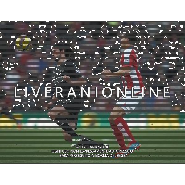 Burnley\'s George Boyd (L) and Stoke City\'s Marc Muniesa in action during todays match Photographer Jack Phillips/CameraSport Football - Barclays Premiership - Stoke City v Burnley - Saturday 22nd November 2014 - Britannia Stadium - Stoke © CameraSport - 43 Linden Ave. Countesthorpe. Leicester. England. LE8 5PG - Tel: +44 (0) 116 277 4147 - admin@camerasport.com - www.camerasport.com ag aldo liverani sas only italy