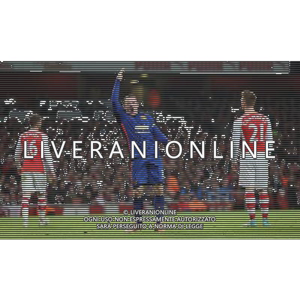 Manchester United\'s Wayne Rooney celebrates THE own goal by Arsenal\'s Kieran Gibbs Photographer Kieran Galvin/CameraSport Football - Barclays Premiership - Arsenal v Manchester United - Saturday 22nd November 2014 - The Emirates Stadium - London © CameraSport - 43 Linden Ave. Countesthorpe. Leicester. England. LE8 5PG - Tel: +44 (0) 116 277 4147 - admin@camerasport.com - www.camerasport.com AG ALDO LIVERANI SAS ONLY ITALY