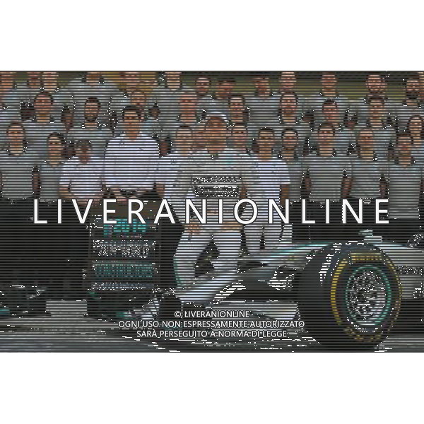 Nico Rosberg (GER) Mercedes AMG F1 at a team photograph. 23.11.2014. Formula 1 World Championship, Rd 19, Abu Dhabi Grand Prix, Yas Marina Circuit, Abu Dhabi, Race Day. AG ALDO LIVERANI SAS ONLY ITALY