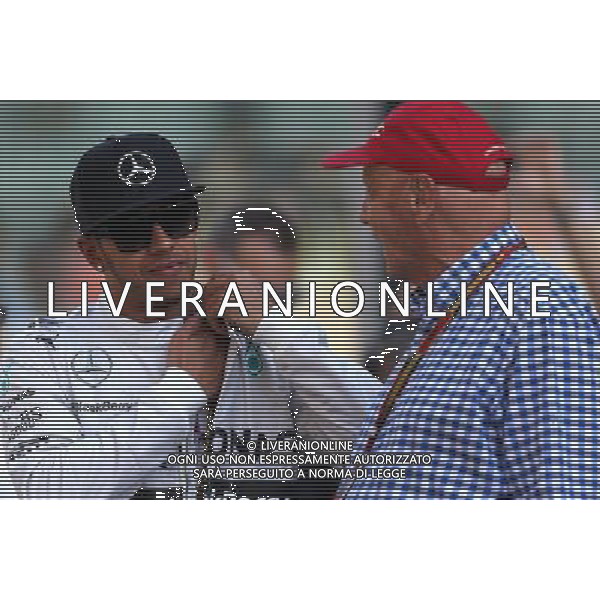 Lewis Hamilton (GBR), Mercedes AMG F1 Team and Niki Lauda (AUT) 23.11.2014. Formula 1 World Championship, Rd 19, Abu Dhabi Grand Prix, Yas Marina Circuit, Abu Dhabi, Race Day. AG ALDO LIVERANI SAS ONLY ITALY