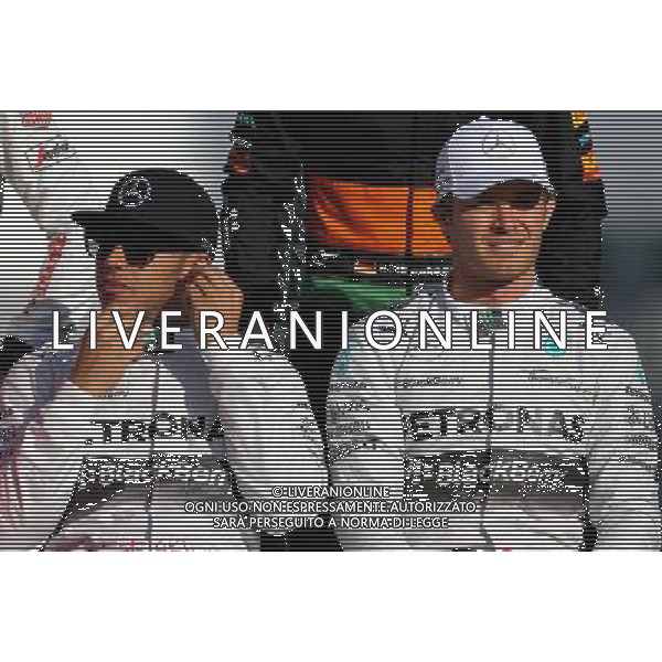 Lewis Hamilton (GBR), Mercedes AMG F1 Team and Nico Rosberg (GER), Mercedes AMG F1 Team 23.11.2014. Formula 1 World Championship, Rd 19, Abu Dhabi Grand Prix, Yas Marina Circuit, Abu Dhabi, Race Day. AG ALDO LIVERANI SAS ONLY ITALY