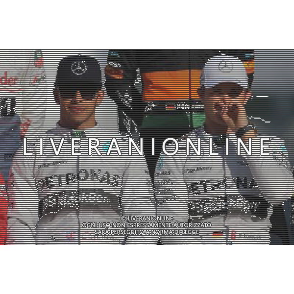 Lewis Hamilton (GBR), Mercedes AMG F1 Team and Nico Rosberg (GER), Mercedes AMG F1 Team 23.11.2014. Formula 1 World Championship, Rd 19, Abu Dhabi Grand Prix, Yas Marina Circuit, Abu Dhabi, Race Day. AG ALDO LIVERANI SAS ONLY ITALY