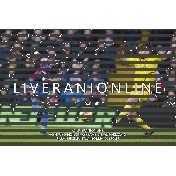 Crystal Palace\'s Yannick Bolasie gets a shot in despite the attentions of Liverpool\'s Adam Lallana Photographer Craig Mercer/CameraSport Football - Barclays Premiership - Crystal Palace v Liverpool - Sunday 23rd November 2014 - Selhurst Park - London © CameraSport - 43 Linden Ave. Countesthorpe. Leicester. England. LE8 5PG - Tel: +44 (0) 116 277 4147 - admin@camerasport.com - www.camerasport.com AG ALDO LIVERANI SAS ONLY ITALY