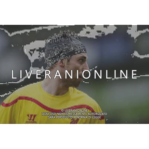 Liverpool\'s Joe Allen sporting some unusual head gear during the match Photographer Craig Mercer/CameraSport Football - Barclays Premiership - Crystal Palace v Liverpool - Sunday 23rd November 2014 - Selhurst Park - London © CameraSport - 43 Linden Ave. Countesthorpe. Leicester. England. LE8 5PG - Tel: +44 (0) 116 277 4147 - admin@camerasport.com - www.camerasport.com AG ALDO LIVERANI SAS ONLY ITALY