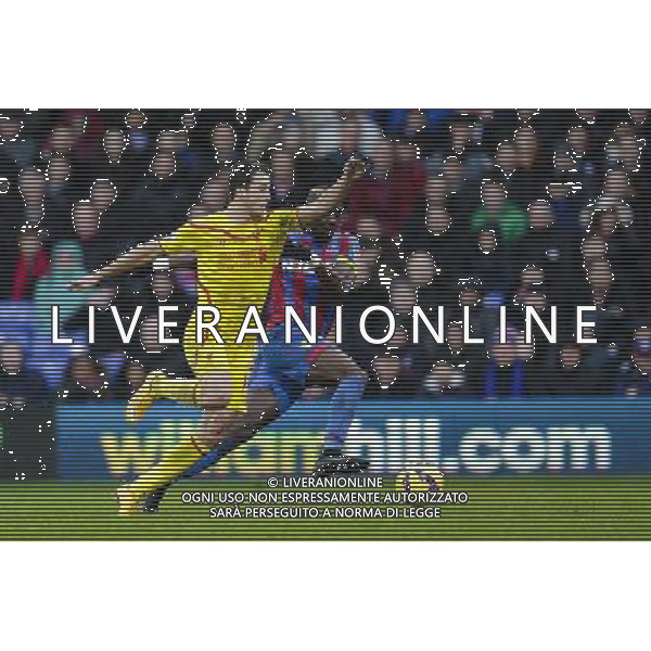 Liverpool\'s Javi Manquillo battles with Crystal Palace\'s Yannick Bolasie Photographer Craig Mercer/CameraSport Football - Barclays Premiership - Crystal Palace v Liverpool - Sunday 23rd November 2014 - Selhurst Park - London © CameraSport - 43 Linden Ave. Countesthorpe. Leicester. England. LE8 5PG - Tel: +44 (0) 116 277 4147 - admin@camerasport.com - www.camerasport.com AG ALDO LIVERANI SAS ONLY ITALY