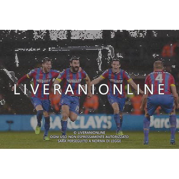 Crystal Palace\'s Mile Jedinak (2nd left) celebrates scoring his sides third goal with team-mates Photographer Craig Mercer/CameraSport Football - Barclays Premiership - Crystal Palace v Liverpool - Sunday 23rd November 2014 - Selhurst Park - London å© CameraSport - 43 Linden Ave. Countesthorpe. Leicester. England. LE8 5PG - Tel: +44 (0) 116 277 4147 - admin@camerasport.com - www.camerasport.com /AGENZIA ALDO LIVERANI SAS - ITALY ONLY - EDITORIAL USE ONLY