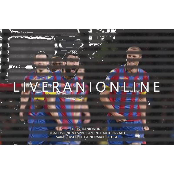 Crystal Palace\'s Mile Jedinak (2nd left) celebrates scoring his sides third goal with team-mates Photographer Craig Mercer/CameraSport Football - Barclays Premiership - Crystal Palace v Liverpool - Sunday 23rd November 2014 - Selhurst Park - London å© CameraSport - 43 Linden Ave. Countesthorpe. Leicester. England. LE8 5PG - Tel: +44 (0) 116 277 4147 - admin@camerasport.com - www.camerasport.com /AGENZIA ALDO LIVERANI SAS - ITALY ONLY - EDITORIAL USE ONLY