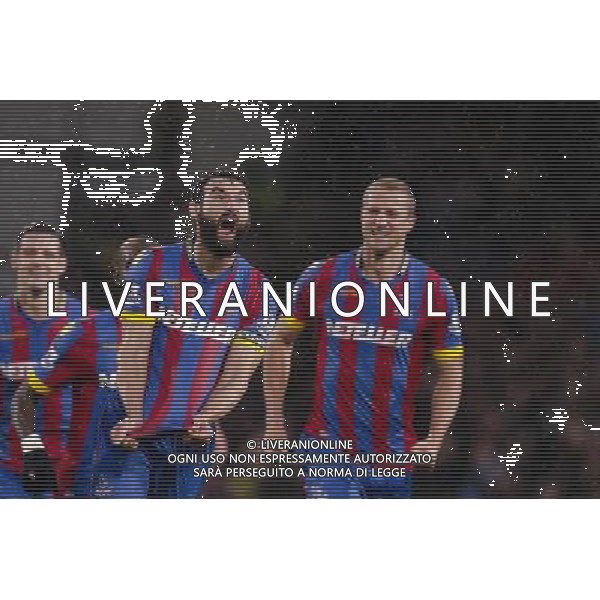 Crystal Palace\'s Mile Jedinak celebrates scoring his sides third goal with team-mates Photographer Craig Mercer/CameraSport Football - Barclays Premiership - Crystal Palace v Liverpool - Sunday 23rd November 2014 - Selhurst Park - London å© CameraSport - 43 Linden Ave. Countesthorpe. Leicester. England. LE8 5PG - Tel: +44 (0) 116 277 4147 - admin@camerasport.com - www.camerasport.com /AGENZIA ALDO LIVERANI SAS - ITALY ONLY - EDITORIAL USE ONLY