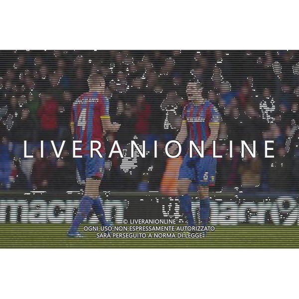 Crystal Palace\'s Scott Dann (right) celebrates with Brede Hangeland at the final whistle Photographer Craig Mercer/CameraSport Football - Barclays Premiership - Crystal Palace v Liverpool - Sunday 23rd November 2014 - Selhurst Park - London å© CameraSport - 43 Linden Ave. Countesthorpe. Leicester. England. LE8 5PG - Tel: +44 (0) 116 277 4147 - admin@camerasport.com - www.camerasport.com /AGENZIA ALDO LIVERANI SAS - ITALY ONLY - EDITORIAL USE ONLY