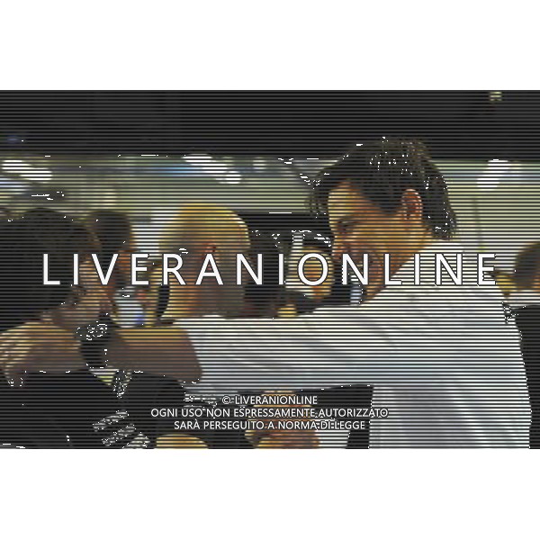 Toto Wolff (GER) Mercedes AMG F1 Shareholder and Executive Director celebrates the World Championship with the team. 23.11.2014. Formula 1 World Championship, Rd 19, Abu Dhabi Grand Prix, Yas Marina Circuit, Abu Dhabi, Race Day. AG ALDO LIVERANI SAS ONLY ITALY