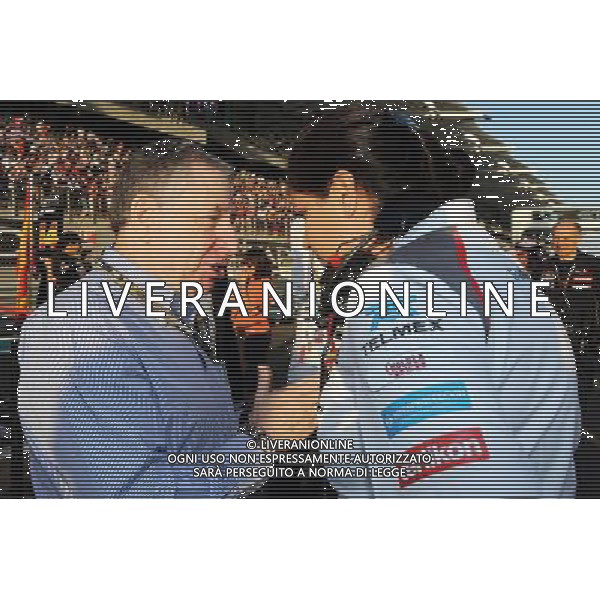 (L to R): Jean Todt (FRA) FIA President with Monisha Kaltenborn (AUT) Sauber Team Principal on the grid. 23.11.2014. Formula 1 World Championship, Rd 19, Abu Dhabi Grand Prix, Yas Marina Circuit, Abu Dhabi, Race Day. AG ALDO LIVERANI SAS ONLY ITALY