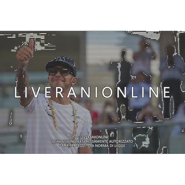 Lewis Hamilton (GBR) Mercedes AMG F1 on the drivers parade. 23.11.2014. Formula 1 World Championship, Rd 19, Abu Dhabi Grand Prix, Yas Marina Circuit, Abu Dhabi, Race Day. AG ALDO LIVERANI SAS ONLY ITALY
