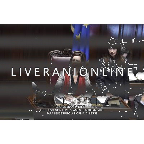 Dichiarazioni di voto del Jobs Act alla camera dall\'aula di Montecitorio Roma 25 novembre 2014 nella foto Laura Boldrini con una sciarpa rossa per commemorare la giornata contro la violenza sulle donne ©Corradetti/Agenzia Aldo Liverani sas
