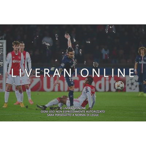 Ezequiel LAVEZZI / Stefano DENSWIL - 25.11.2014 - Paris Saint Germain / Ajax Amsterdam - Champions League Photo : Dave Winter / Icon Sport AG ALDO LIVERANI SAS ONLY ITALY