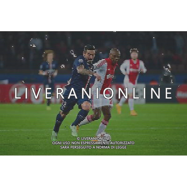 Ezequiel LAVEZZI / Thulani SERERO - 25.11.2014 - Paris Saint Germain / Ajax Amsterdam - Champions League Photo : Dave Winter / Icon Sport AG ALDO LIVERANI SAS ONLY ITALY