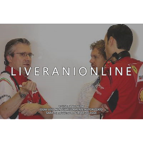Pat Fry (GBR), Scuderia Ferrari, Technical Director and Sebastian Vettel (GER) 25.11.2014. Formula 1 Testing, Day One, Yas Marina Circuit, Abu Dhabi, Tuesday. AG ALDO LIVERANI SAS ONLY ITALY