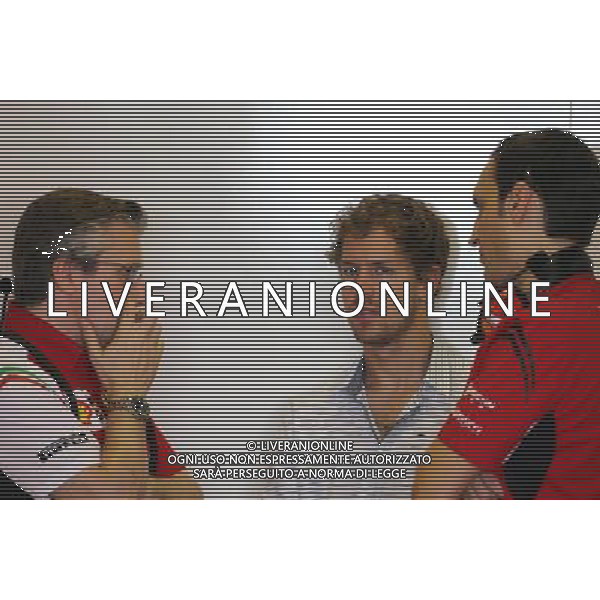 Pat Fry (GBR), Scuderia Ferrari, Technical Director and Sebastian Vettel (GER) 25.11.2014. Formula 1 Testing, Day One, Yas Marina Circuit, Abu Dhabi, Tuesday. AG ALDO LIVERANI SAS ONLY ITALY