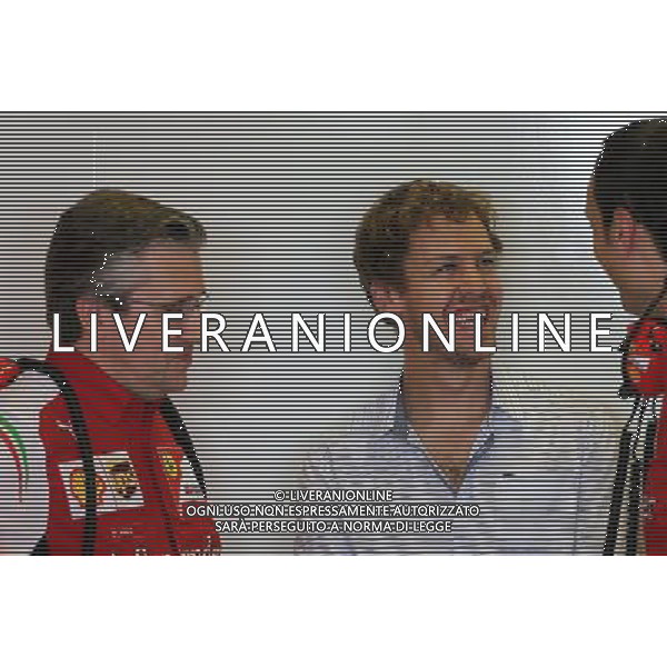 Pat Fry (GBR), Scuderia Ferrari, Technical Director and Sebastian Vettel (GER) 25.11.2014. Formula 1 Testing, Day One, Yas Marina Circuit, Abu Dhabi, Tuesday. AG ALDO LIVERANI SAS ONLY ITALY