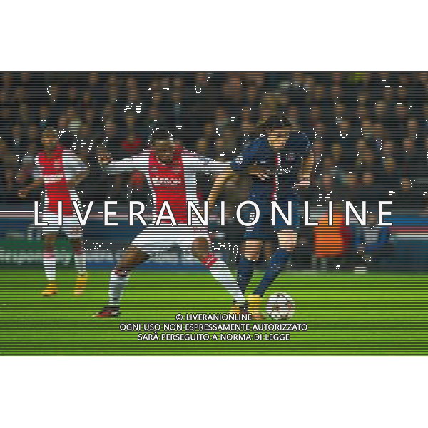 Edinson CAVANI / Stefano DENSWIL - 25.11.2014 - Paris Saint Germain / Ajax Amsterdam - Champions League Photo : Dave Winter / Icon Sport AG ALDO LIVERANI SAS ONLY ITALY