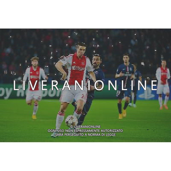 Nick VIERGEVER / Ezequiel LAVEZZI - 25.11.2014 - Paris Saint Germain / Ajax Amsterdam - Champions League Photo : Dave Winter / Icon Sport AG ALDO LIVERANI SAS ONLY ITALY