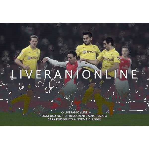 Arsenal\'s Santi Cazorla in action during todays match Photographer Kieran Galvin/CameraSport Football - UEFA Champions League First Round Group D - Arsenal v Borussia Dortmund - Wednesday 26th November 2014 - Emirates Stadium - London © CameraSport - 43 Linden Ave. Countesthorpe. Leicester. England. LE8 5PG - Tel: +44 (0) 116 277 4147 - admin@camerasport.com - www.camerasport.com AG ALDO LIVERANI SAS ONLY ITALY